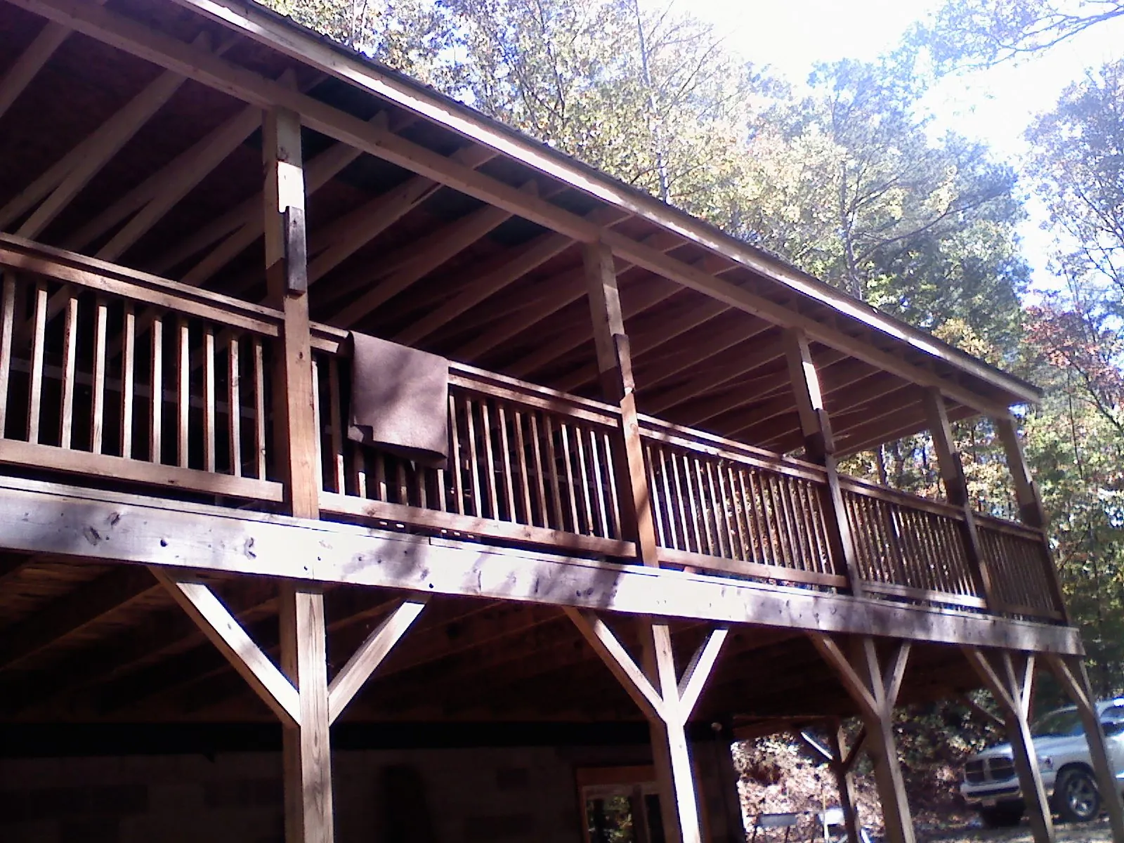 Timber framing under a new elevated porch and deck — Roof Leak Repair in Guntown by Roofing Brothers